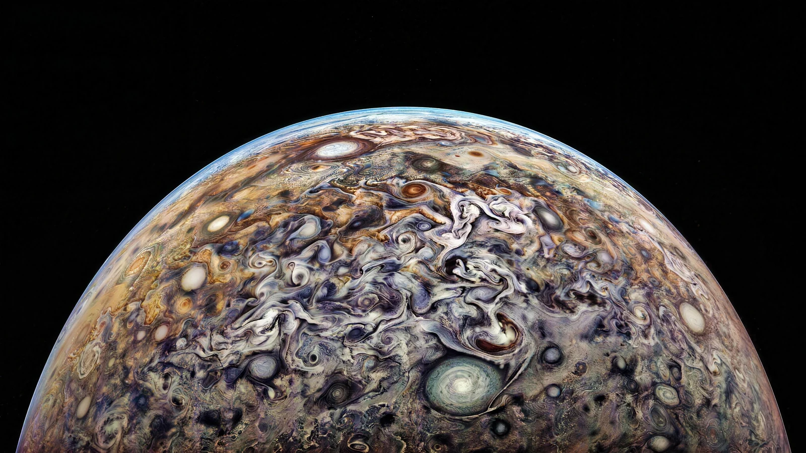 Jupiter's swirling storm clouds seen from above the cloud tops